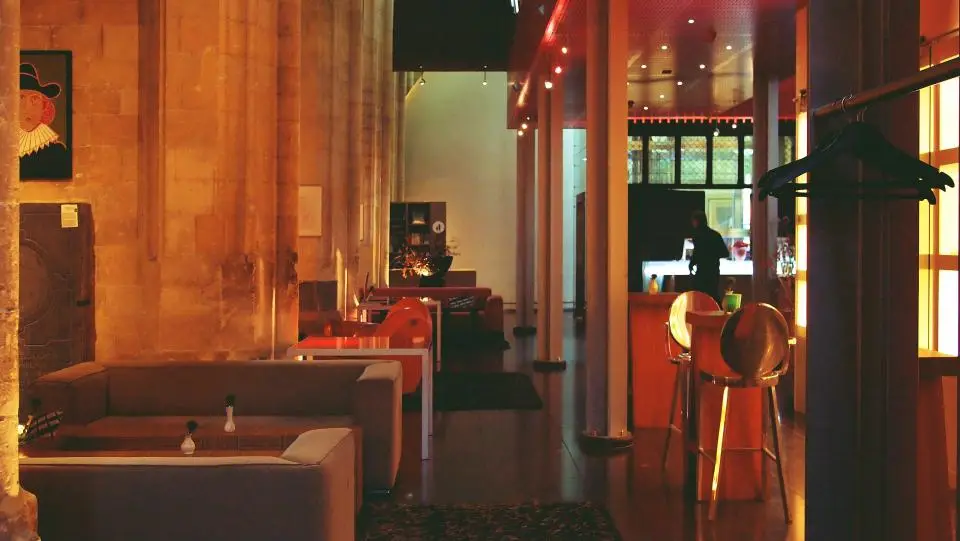 A hotel lounge and bar glowing amber at night